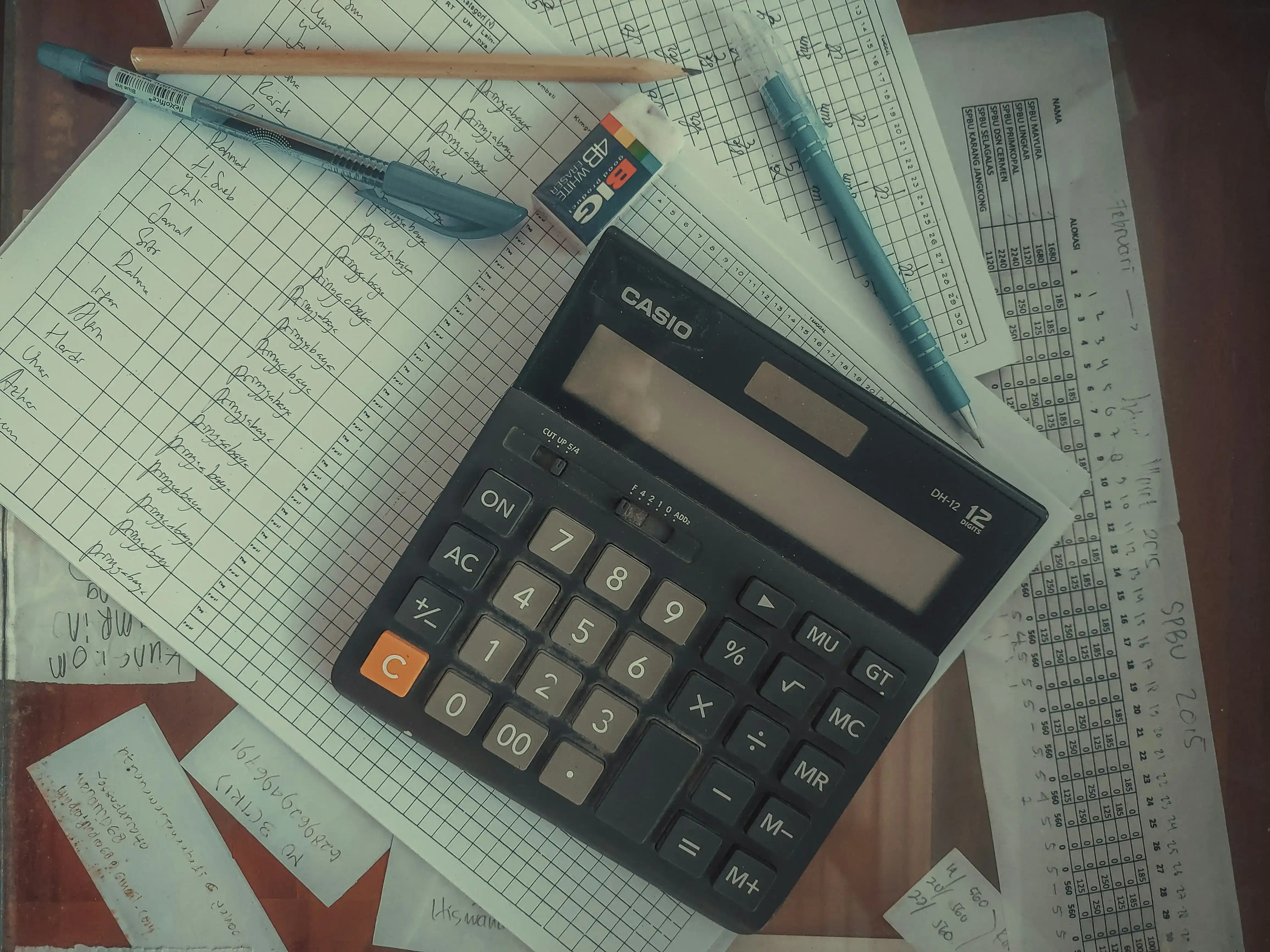 Audit team analyzing financial reports